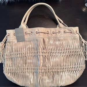 Anthropologie leather tote. Great condition with tags.